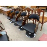 A SET OF FOUR EAMES STYLE SWIVEL AND ADJUSTABLE BENTWOOD CHAIRS