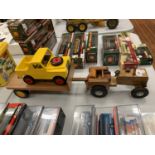 A WOODEN TRACTOR, TRAILER AND LAND ROVER