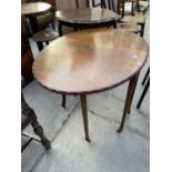 AN EDWARDIAN MAHOGANY OVAL SUTHERLAND TABLE