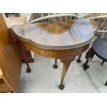 REPRODUCTION MAHOGANY DEMI-LUNE FOLD OVER CARD TABLE ON CABRIOLE LEGS AND BALL & CLAW FEET, 36" WIDE