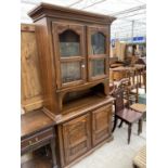 A MODERN HARDWOOD DRESSER WITH GLAZED UPPER PORTION AND SHAM LOUVRE DOORS TO BASE, 42" WIDE