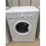 A WHITE INDESIT 8KG WASHING MACHINE BELIEVED IN WORKING ORDER BUT NO WARRANTY