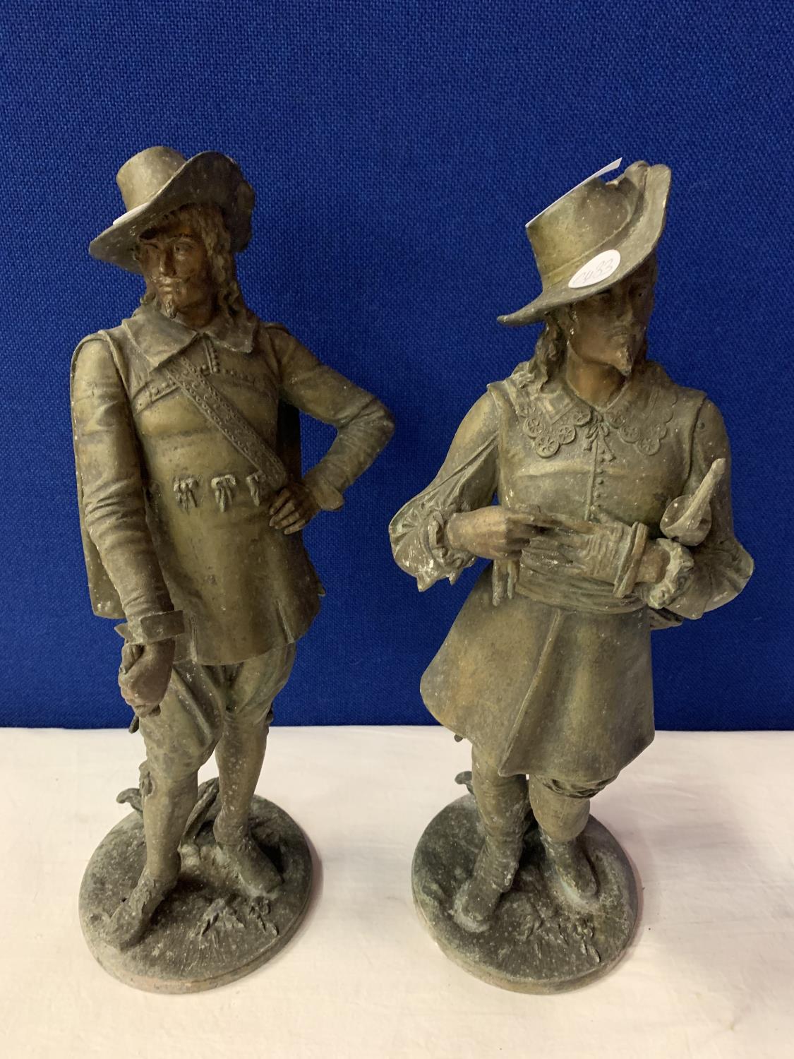 A PAIR OF SPELTER CAVALIER STYLE GENTLEMEN OFFICERS