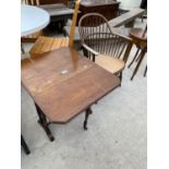 AN EDWARDIAN MAHOGANY SUTHERLAND TABLE AND COMB BACK WINDSOR STYLE CHAIR