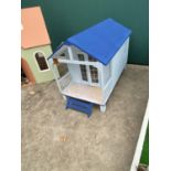 A DOLLS HOUSE GARDEN SHED WITH FURNITURE