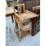 AN EARLY 20TH CENTURY CHILDS METAMORPHIC HIGHCHAIR