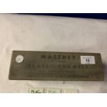 A VINTAGE BOX CONTAINING MATTHEY GLASS ENAMEL SAMPLES