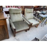 A PAIR OF GUY ROGERS LOUNGE CHAIRS, POSSIBLY MANHATTAN