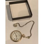 A GOLD PLATED POCKET WATCH AND CHAIN IN WORKING ORDER