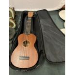 A CHILD'S MAHALO GUITAR TO INCLUDE CARRY CASE