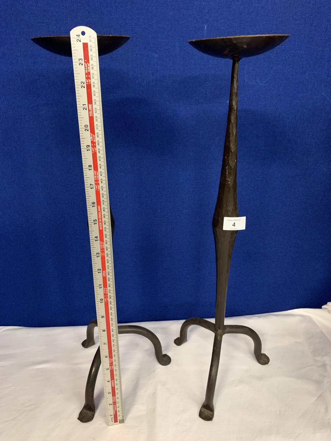 A PAIR OF TALL WROUGHT IRON CANDLESTICKS - Image 2 of 2