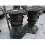 TWO CAST IRON GARDEN URNS