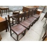 A SET OF SIX EARLY 20TH CENTURY OAK JACOBEAN STYLE DINING CHAIRS WITH HALF TURNED SPINDLE BACKS,