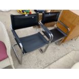 TWO RETRO STYLE LEATHERETTE AND CHROME ARMCHAIRS