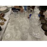 A LARGE ASSORTMENT OF GLASSWARE TO INCLUDE THREE CUT GLASS TRIFLE BOWLS