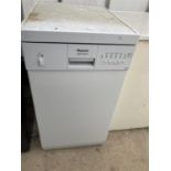 A SLIM HOTPOINT DISHWASHER BELIEVED IN WORKING ORDER BUT NO WARRANTY