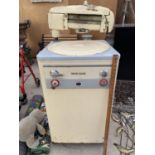 A VINTAGE 'ENGLISH ELECTRIC' TOP LOADER WASHING MACHINE WITH BUILT IN MANGLE