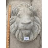 A LARGE STONE EFFECT LION FACE WALL PLAQUE