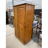 A MODERN PINE WARDROBE WITH TWO DOORS