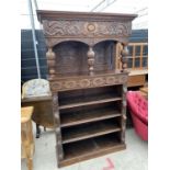 A HEAVILY CARVED VICTORIAN OAK OPEN BOOKCASE WITH COURT CUPBOARD STYLE OPEN TOP, 45 INCHES WIDE