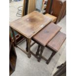 AN OAK NEST OF THREE TABLES