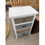 A MODERN CHEST OF FOUR DRAWERS