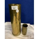 A 1939 TRENCH ART SHELL VASE AND A SIMILAR SMALLER VERSION
