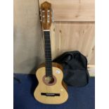 A CLECA ACOUSTIC GUITAR WITH SOFT CARRY CASE