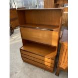 A RETRO TEAK LOUNGE UNIT WITH FOLD DOWN FRONT AND THREE DRAWERS, 36" WIDE, 55" HIGH