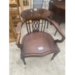 AN EDWARDIAN MAHOGANY AND INLAID ELBOW CHAIR