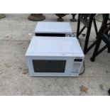 TWO MICROWAVE OVENS - 1 IN W/O. PANASONIC NOT IN FULL W/O - BUT NO WARRANTY