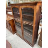 A 19TH CENTURY MAHOGANY TWO DOOR GLAZED BOOKCASE WITH ARCHED DOORS, 44" WIDE, 59.5" HIGH