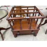 A MAHOGANY CANTERBURY STYLE MAGAZINE RACK