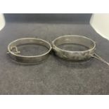 TWO MARKED SILVER BANGLES