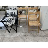 THREE SLATTED WOODEN FOLDING CHAIRS AND TWO DIRECTORS CHAIRS