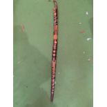 A WOODEN SNAKE HANDLE WALKING STICK WITH ORNATE CARVING JAMAICA