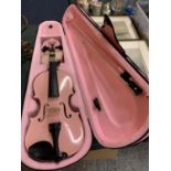 A PINK ARCHETTO VIOLIN WITH MATCHING CARRY CASE