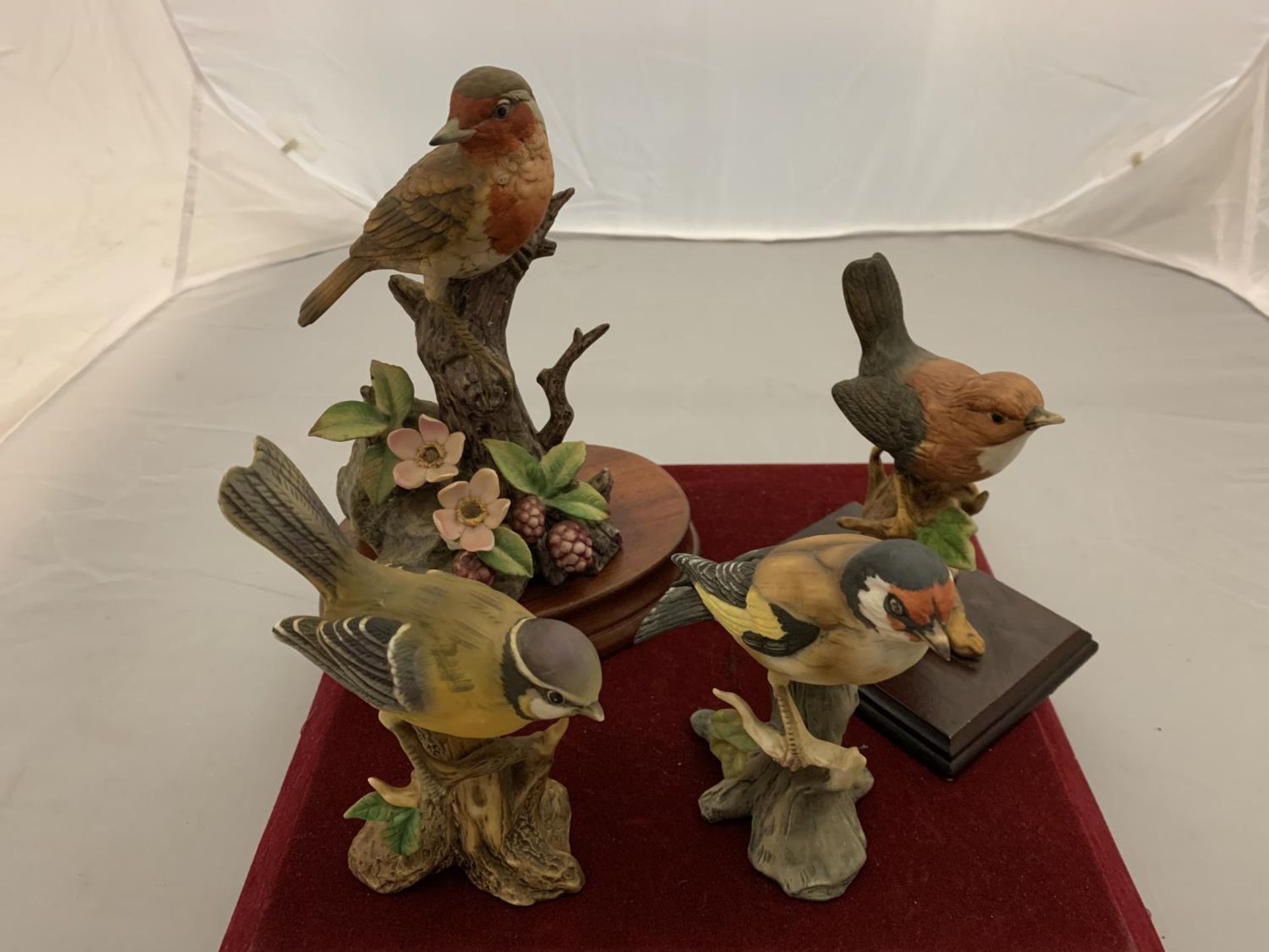 FOUR VARIOUS BIRD FIGURINES