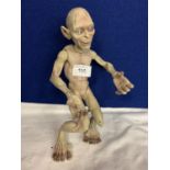 A LORD OF THE RINGS 'GOLLUM' FIGURE HEIGHT APPROXIMATELY 20CM