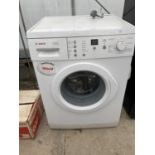 A WHITE BOSCH WASHING MACHINE BELIEVED IN WORKING ORDER BUT NO WARRANTY