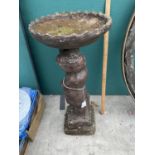 A CONCRETE BIRDBATH