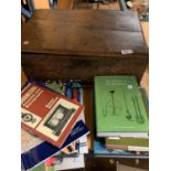 A WOODEN FRUIT BOX WITH LID (A/F) AND AN ASSORTMENT OF FACTUAL BOOKS