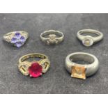 FIVE VARIOUS SILVER DRESS RINGS