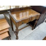 A BARRED OAK HALL TABLE ON BALUSTER SUPPORTS WITH SINGLE DRAWER