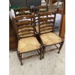 FOUR RUSH SEATED OAK LADDER BACK CHAIRS