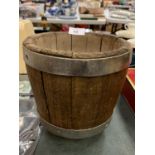 A VINTAGE WOODEN AND METAL CHEESE MOULD
