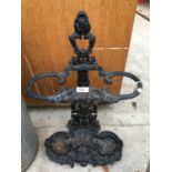 A HEAVY CAST IRON VINTAGE STICK STAND