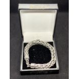 A BOXED HEAVY SILVER BRACELET