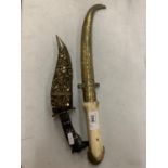 A BONE HANDLED PERSIAN KIFE AND A HORN HANDLED INDIAN KNIFE