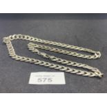 A HEAVY CURB LINK 925 MARKED SILVER CHAIN